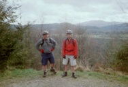 Fit lads waiting at the top of a climb